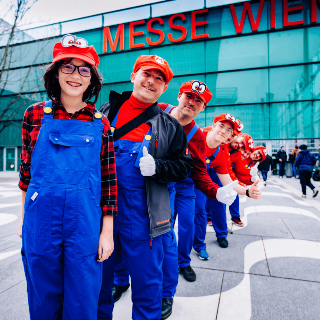 Family Group of Super Mario Cosplayer in front of the VIECC, Messe Wien